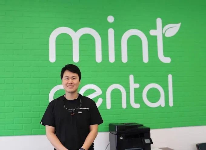 Mint Dental office or team photo, real location, warm and candid